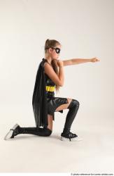 Naty BATGIRL KNEELING POSE 2